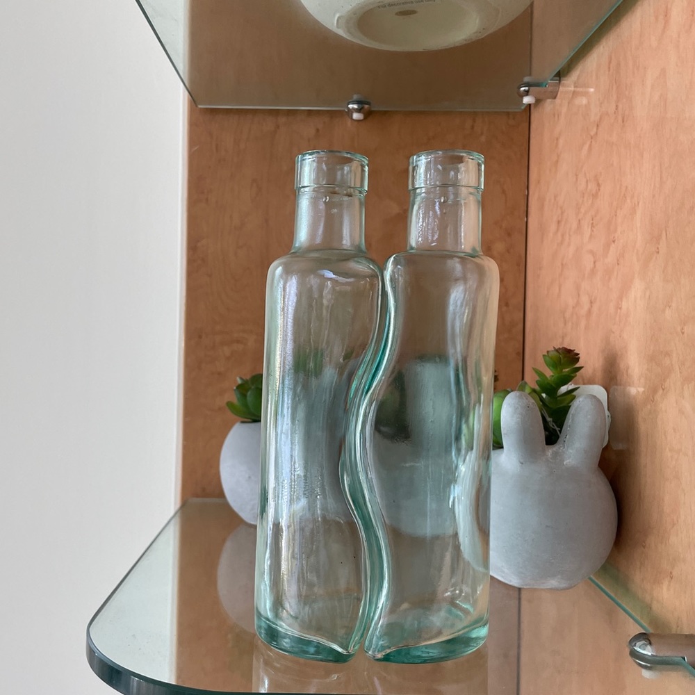 Interlocking tinted glass vase set art